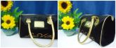 Bolsa bau preta com dourado