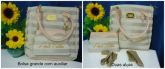 Bolsa bege com auxiliar